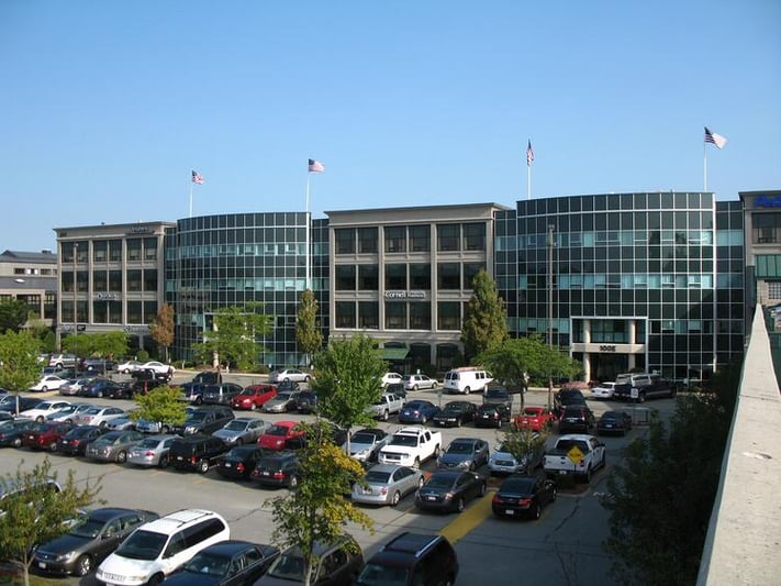 100 Cummings Center from East Garage OnBrand24 Headquarters